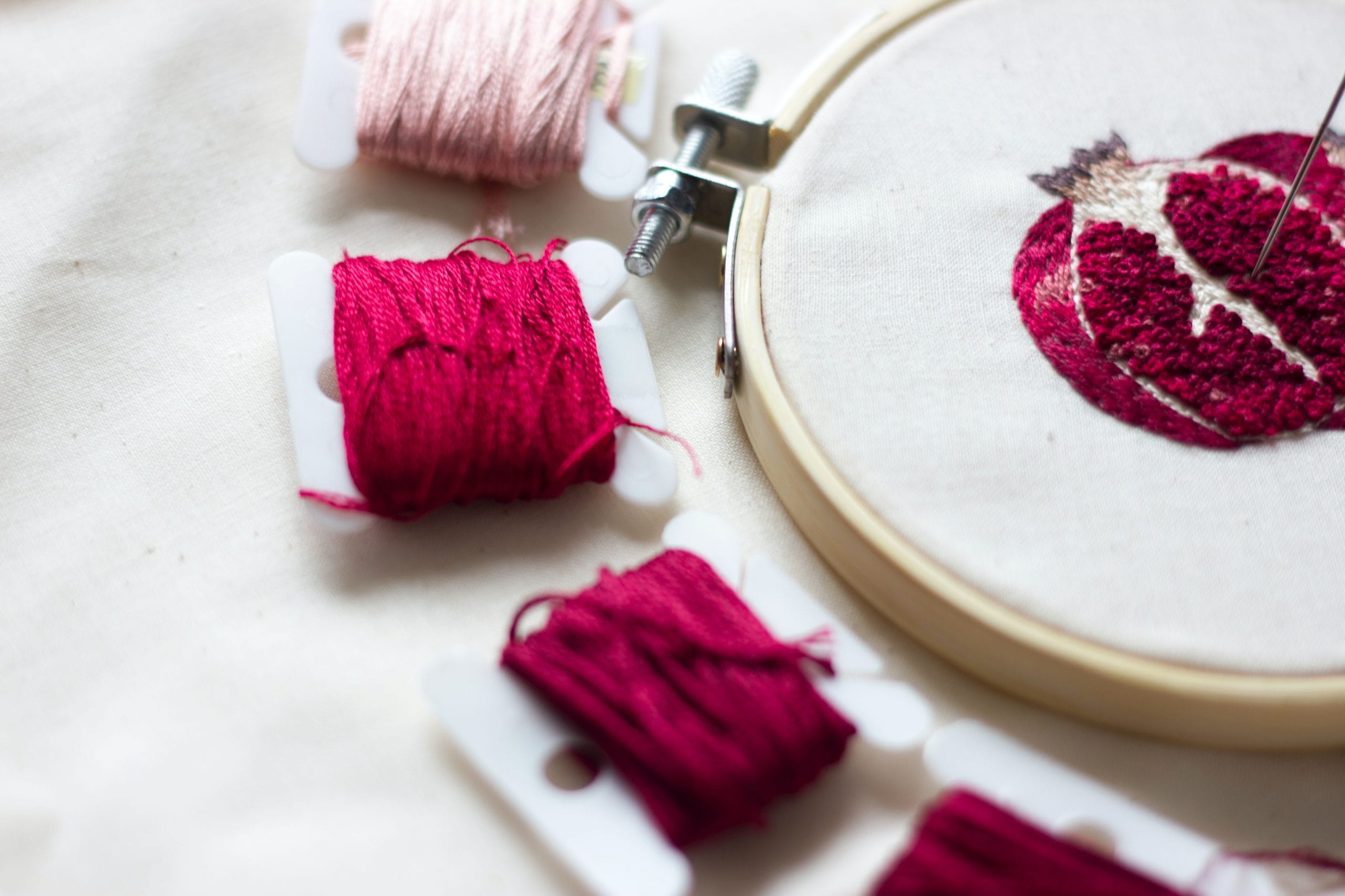 Embroidered pomegranates. Ifrah Akhter/Adobe Stock